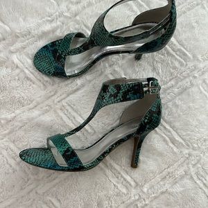 Snakeskin heels worn once.  Black, teal, blue and aqua color